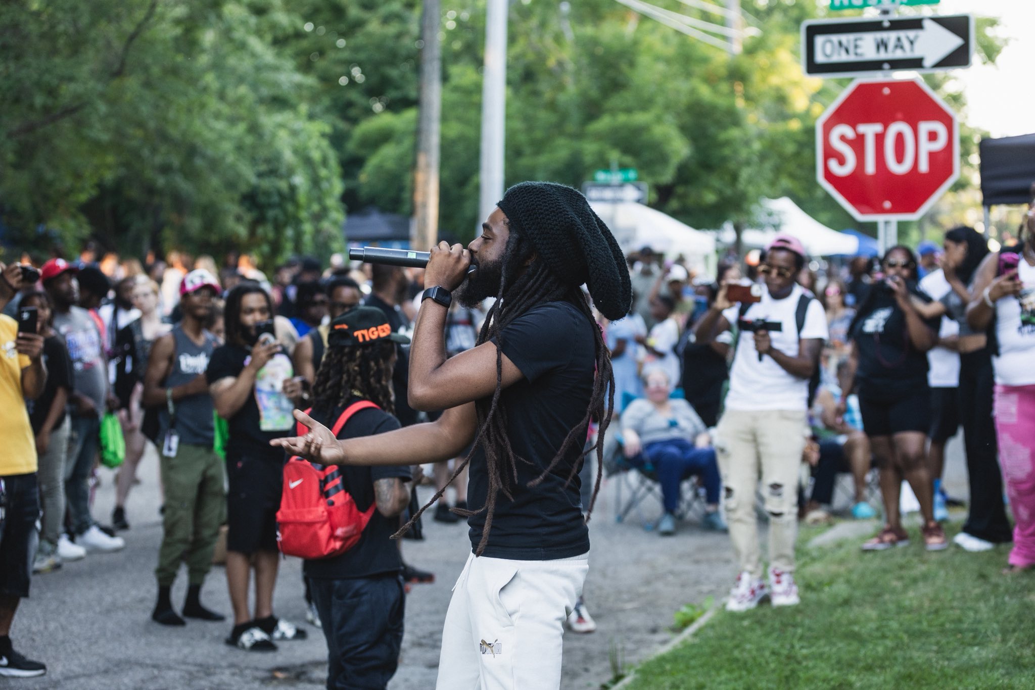 MC performing on the street corner