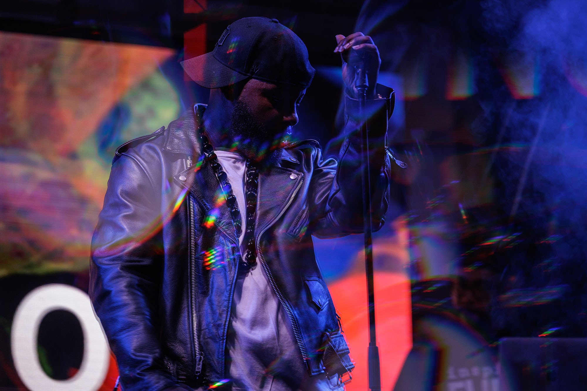 Performer under dramatic stage lights